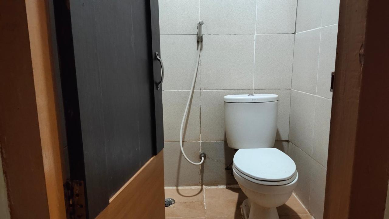 De' Premium Hotel Kartini 巨港 外观 照片