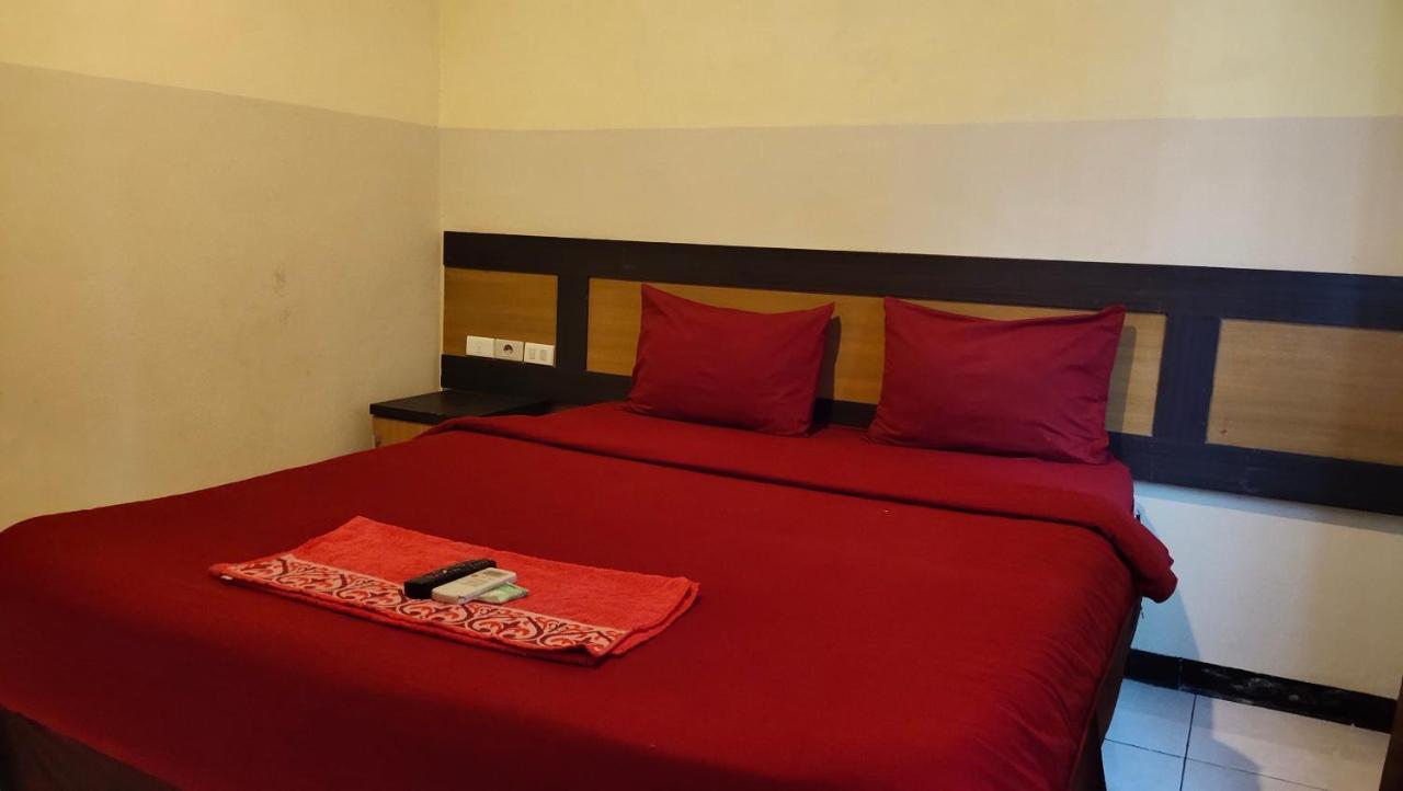 De' Premium Hotel Kartini 巨港 外观 照片